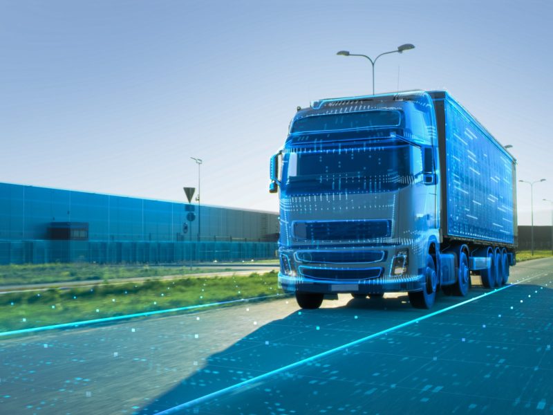 Advanced,Technology,Concept:,Big,White,Semi-truck,With,Cargo,Trailer,Drives